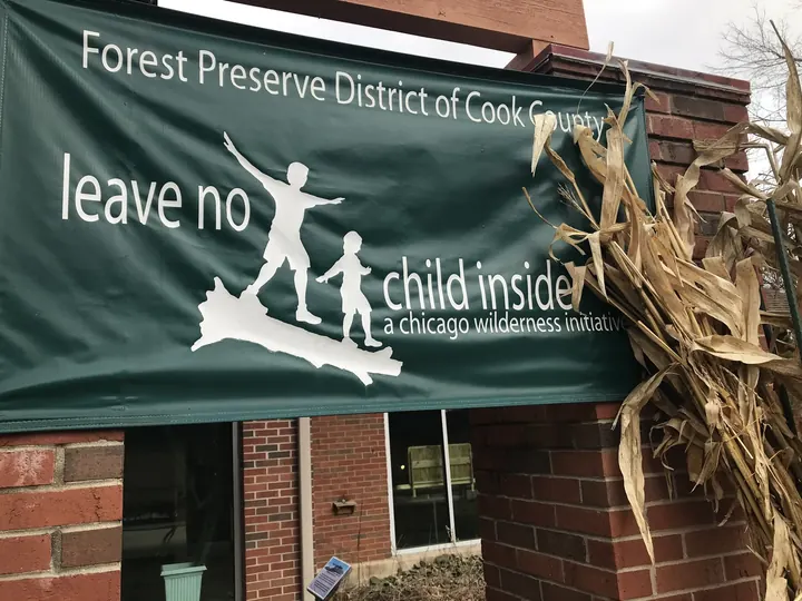 A "Leave No Child Inside" banner from the Forest Preserve District of Cook County.