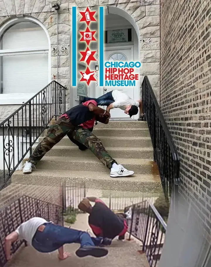 Two b-boys dancing on a greystone stoop.